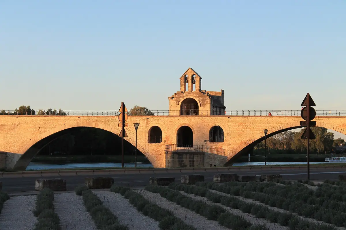 Pont Saint-Bénézet and its small chapel glowing in warm evening light